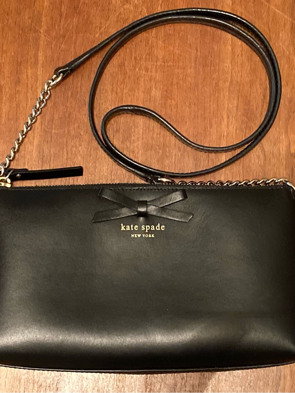 kate spade black leather bow crossbody with gold-tone chain